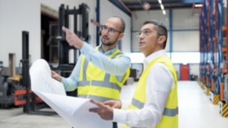 Experts from Linde Material Handling in action at Yanmar Compact Equipment Europe. Experts from Linde Material Handling plan Yanmar Compact Equipment Europe’s new logistics center.